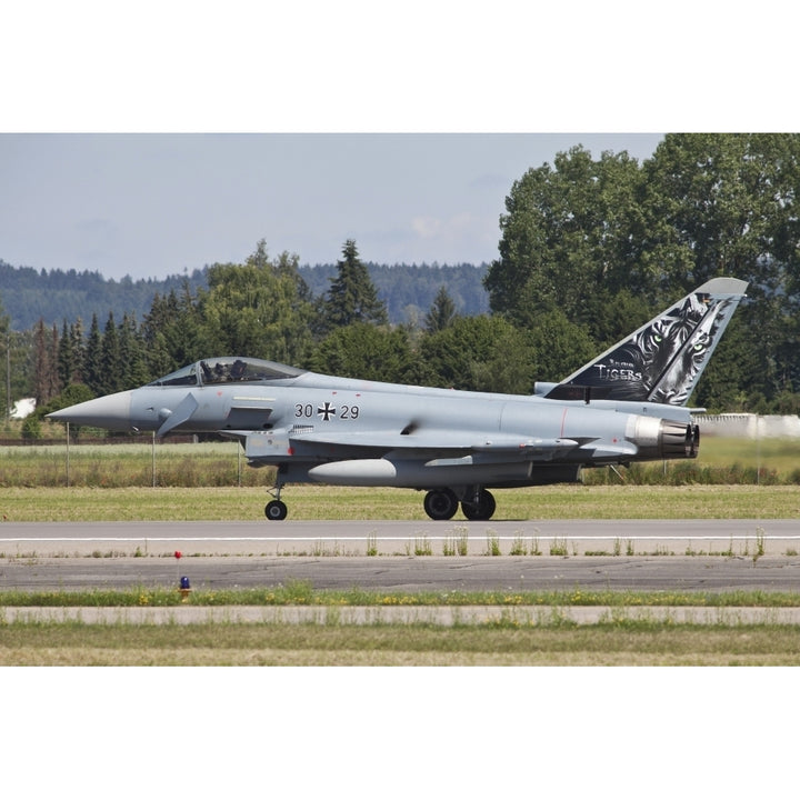 Eurofighter Typhoon of the German Air Force taxiing down the runway Poster Print Image 1