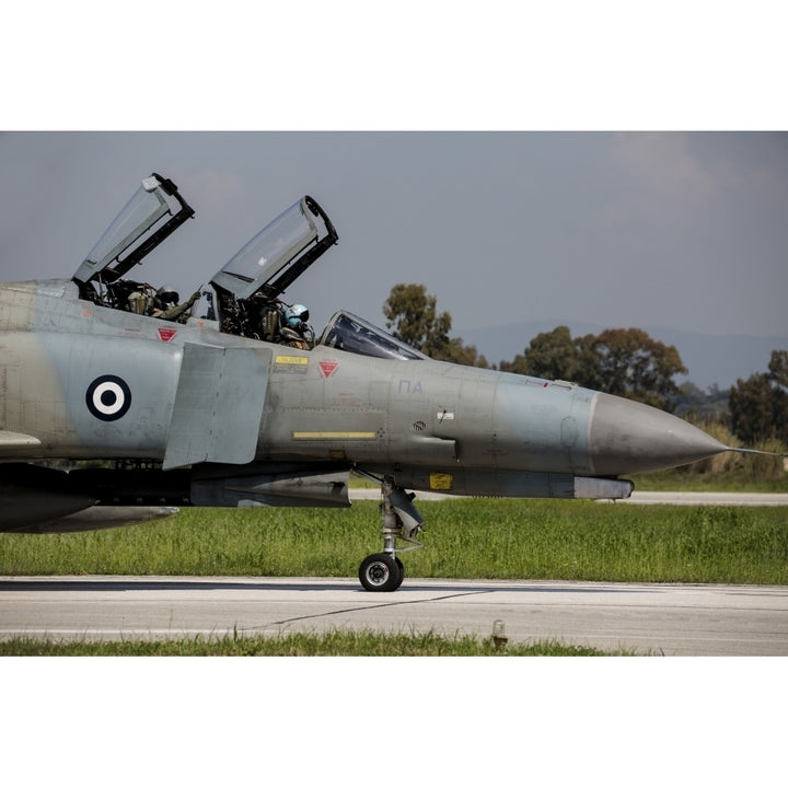 Pilots sitting in the cockpit of a Hellenic Air Force F-4E Phantom Poster Print Image 1