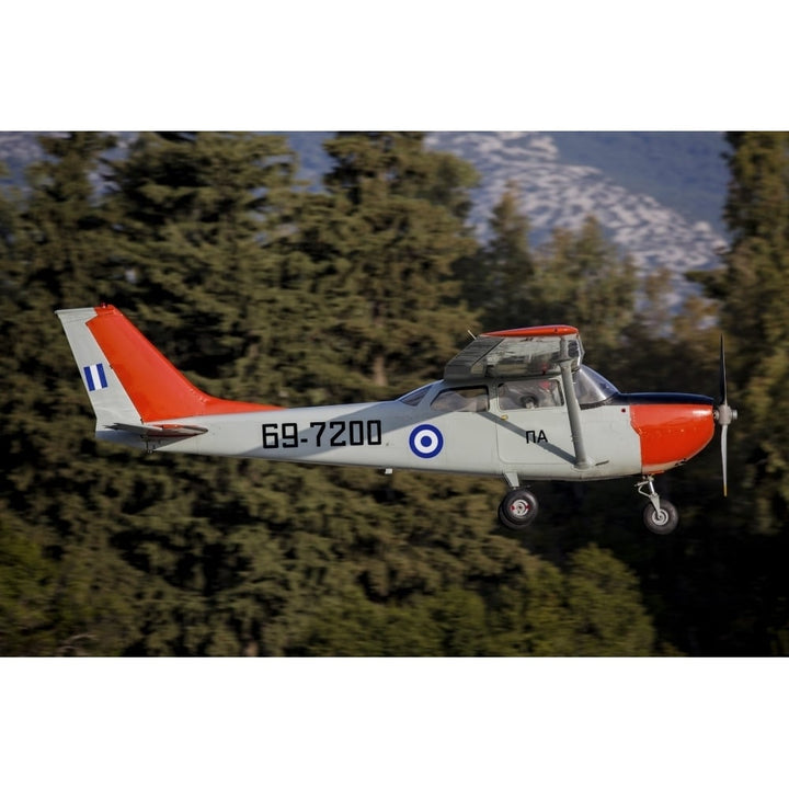 A T-41D trainer aircraft of the Hellenic Air Force flying over Tatoi Greece Poster Print Image 1