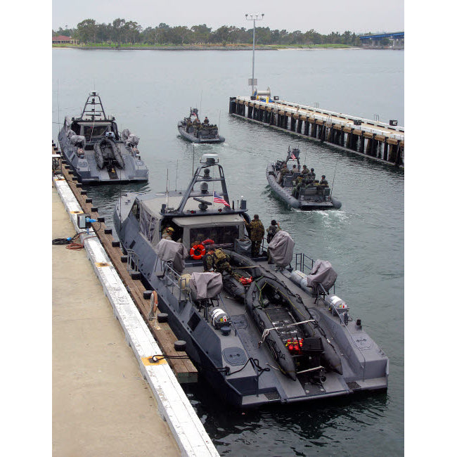 A MK-V Special Operations Craft tied pierside manned and loaded with combat rubber raiding craft Poster Print by Michael Image 1