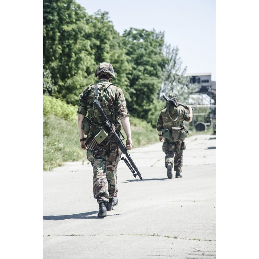 Two NATO soldiers during the military operation. Poster Print by Oleg Zabielin/Stocktrek Images Image 1