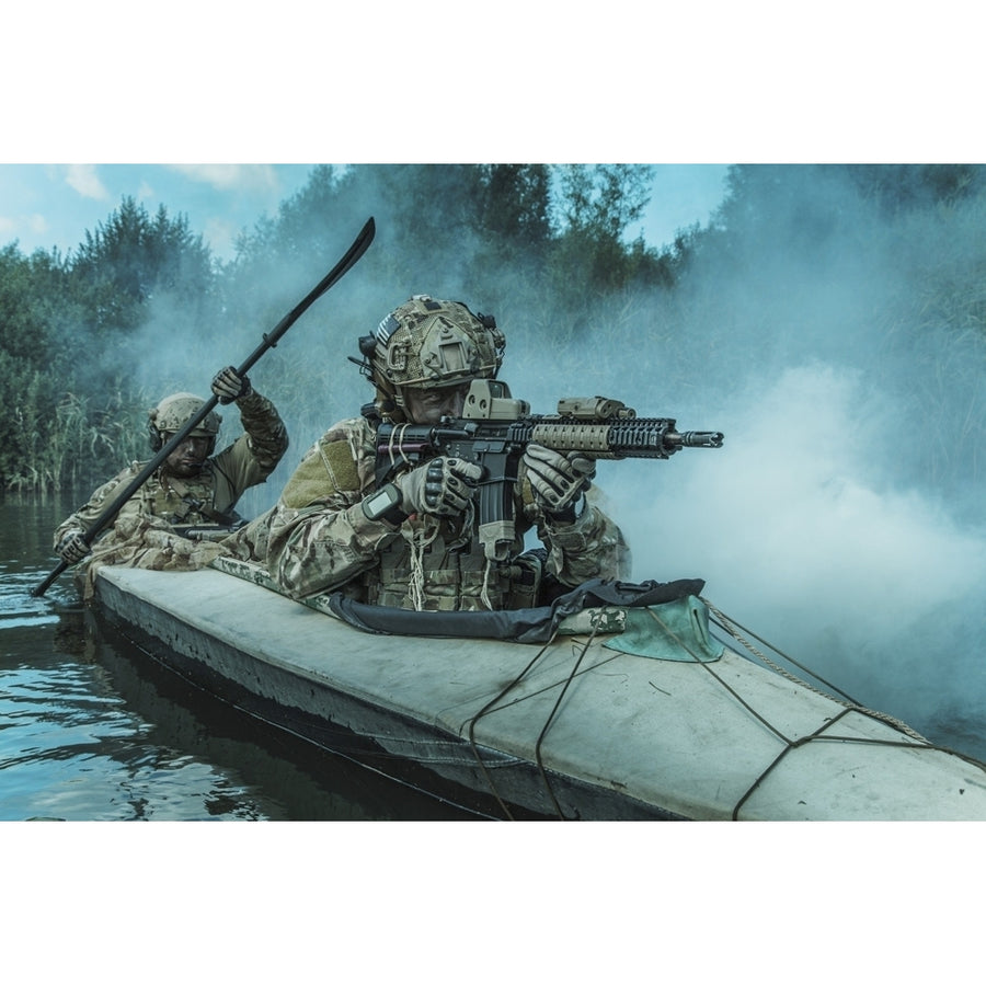 Special forces operators in a military kayak. Poster Print by Oleg Zabielin/Stocktrek Images Image 1