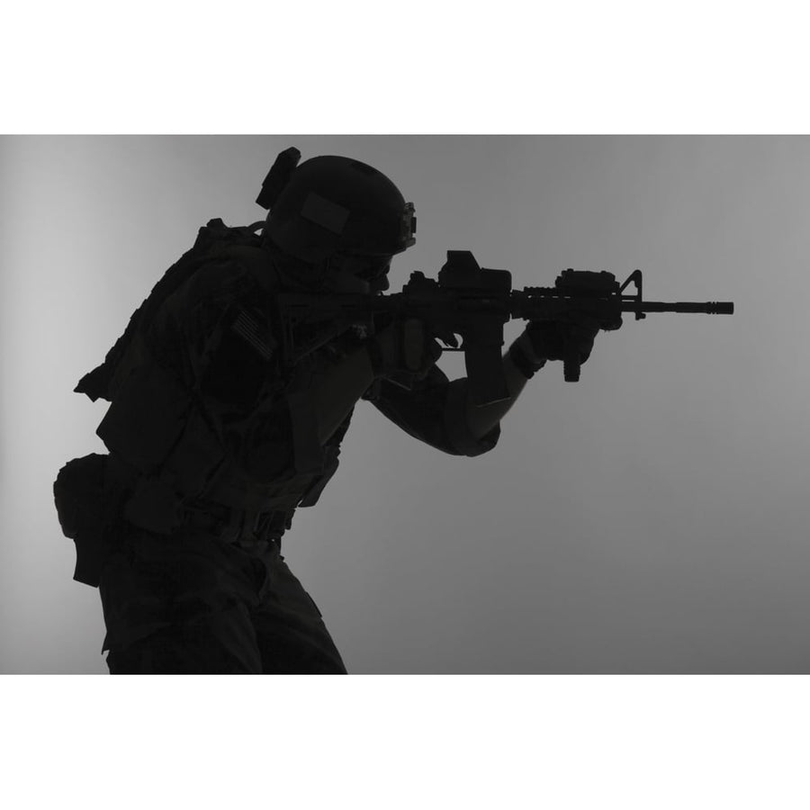 Silhouette of a U.S. Marine Corps Marsoc raider aiming gun gray background. Poster Print by Oleg Zabielin/Stocktrek Ima Image 1