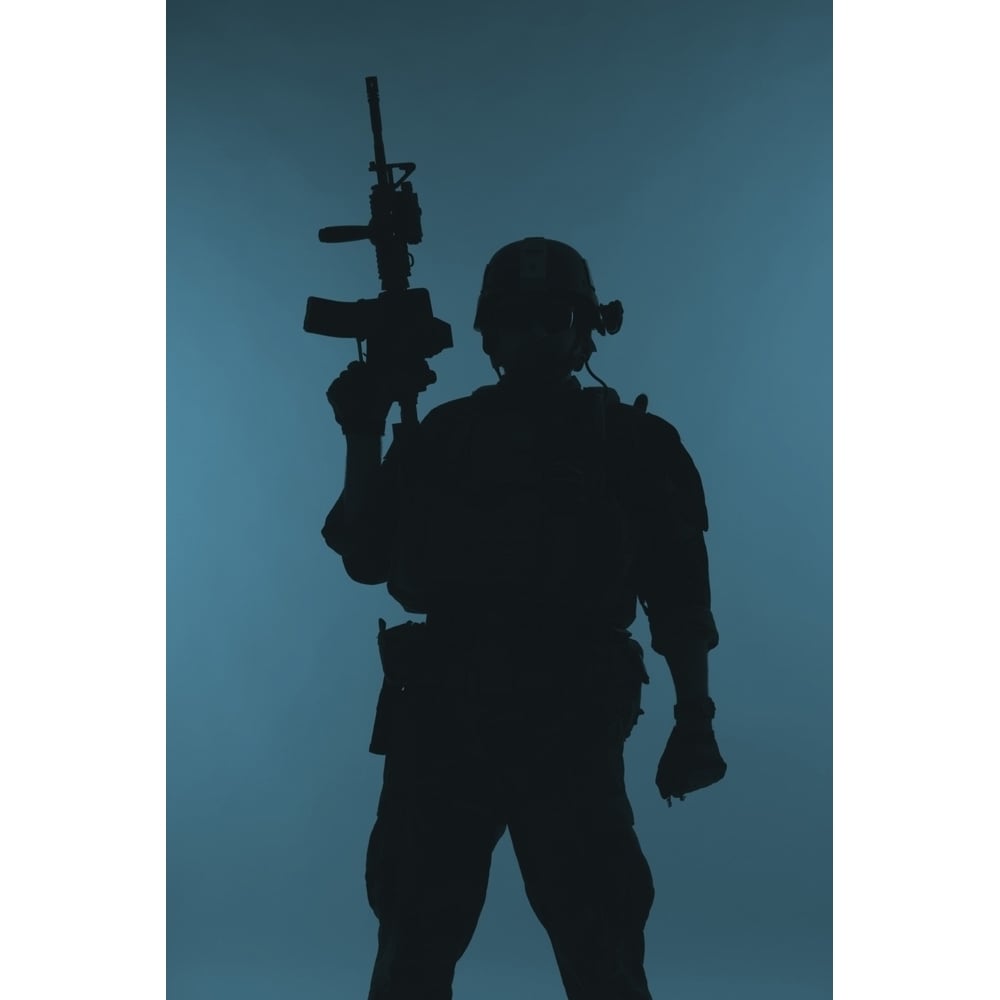 Silhouette of a U.S. Marine Corps Marsoc raider with weapon blue background. Poster Print by Oleg Zabielin/Stocktrek Im Image 1