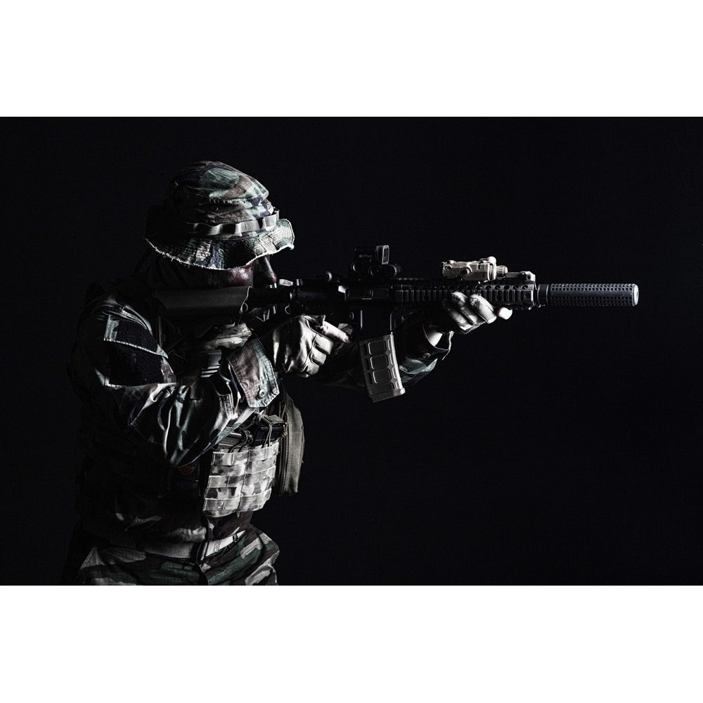 Contour shot of U.S. special forces soldier in camouflage uniform holding weapon. Poster Print by Oleg Zabielin/Stocktre Image 1