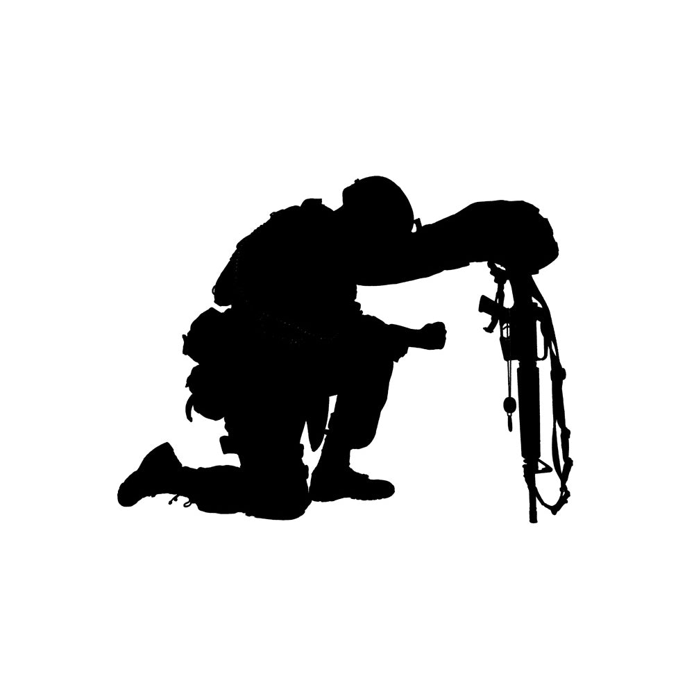 Silhouette of a soldier kneeling in respect for a fallen comrade. Poster Print by Oleg Zabielin/Stocktrek Images Image 1