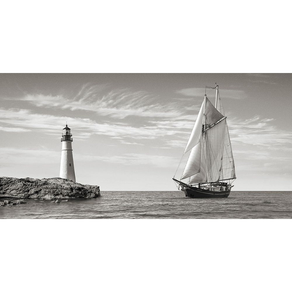 Sailboat approaching Lighthouse Mediterranean Sea-VARPDX2AP7108 Image 1