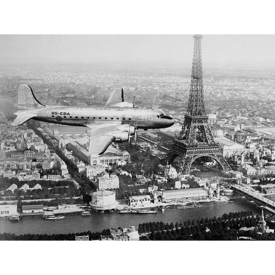 Airplane over Paris Poster Print by Anonymous-VARPDX3AP4320 Image 1