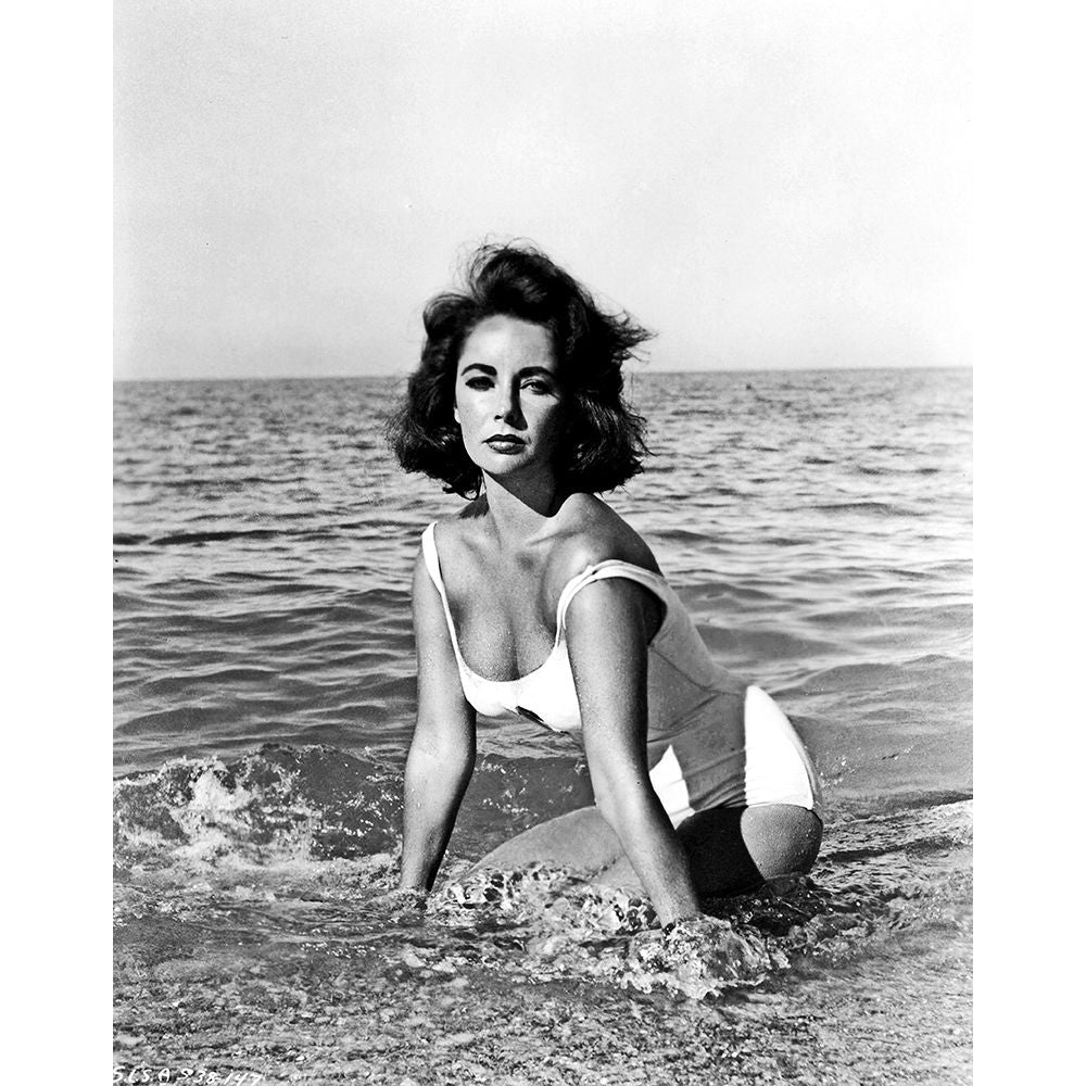 Elizabeth Taylor - In the surf Poster Print by Hollywood Photo Archive Hollywood Photo Archive-VARPDX489882 Image 1