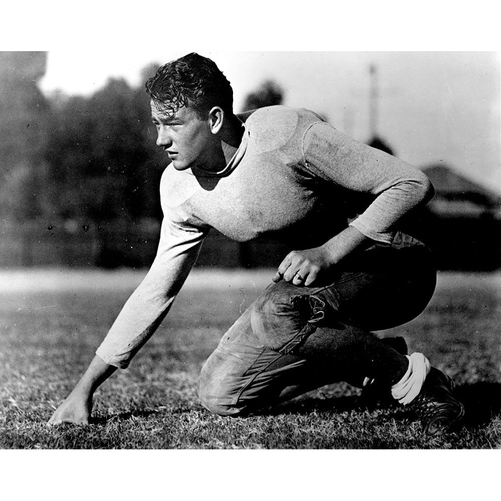 John Wayne - Football Poster Print by Hollywood Photo Archive Hollywood Photo Archive-VARPDX490108 Image 1