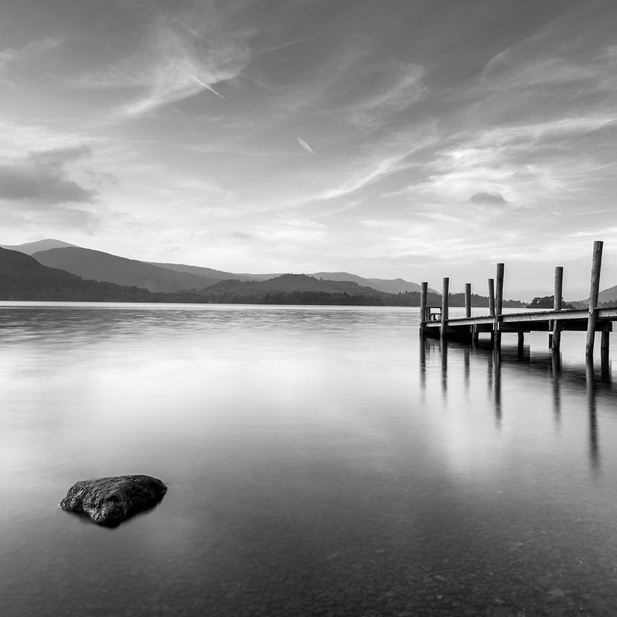 Pier on still lake by Assaf Frank-VARPDXAF20111114851C10 Image 1