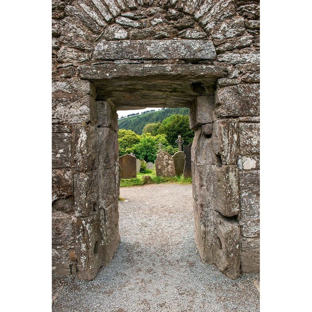 Ancient door marks the passageway between the old church and graveyard at Glendalough Monastery Poster Print Betty Image 1