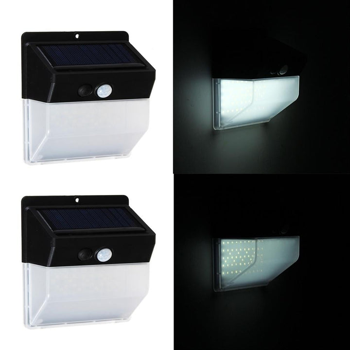 100 LED Solar PIR Motion Sensor Light Outdoor Garden Security Wall Lamp 3 Modes Image 11