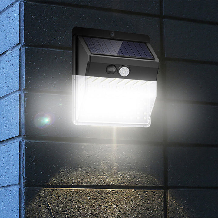 136LED Solar Light Motion Sensor Four-sided Lighting IP65 Waterproof 3 Lighting Modes lamp Gates Courtyard Park Garden Image 3