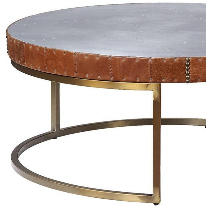 36" Brown And Silver Leather And Metal Round Coffee Table Image 4