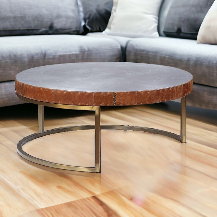 36" Brown And Silver Leather And Metal Round Coffee Table Image 5