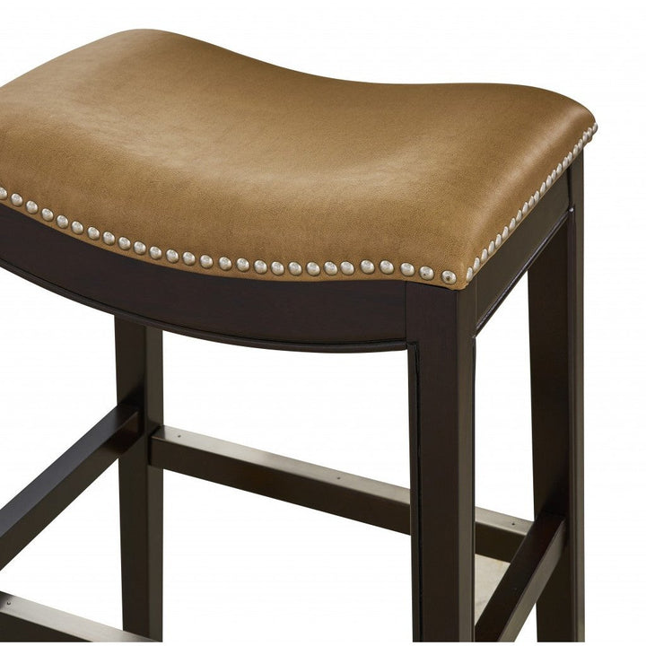 31" Tan And Espresso Faux Leather And Solid Wood Backless Counter Height Bar Chair Image 2