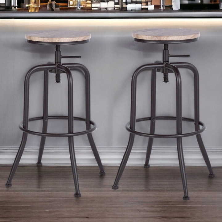 Set of Two Adjustable Height Natural And Black Steel Swivel Backless Counter Height Bar Chairs Image 10