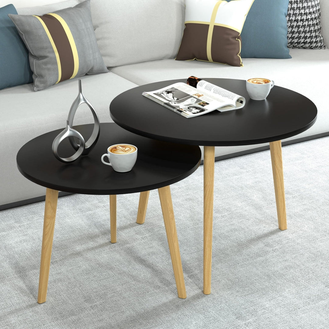 Set Of Two 20" Wood Brown And Black Round Nested Tables Image 1