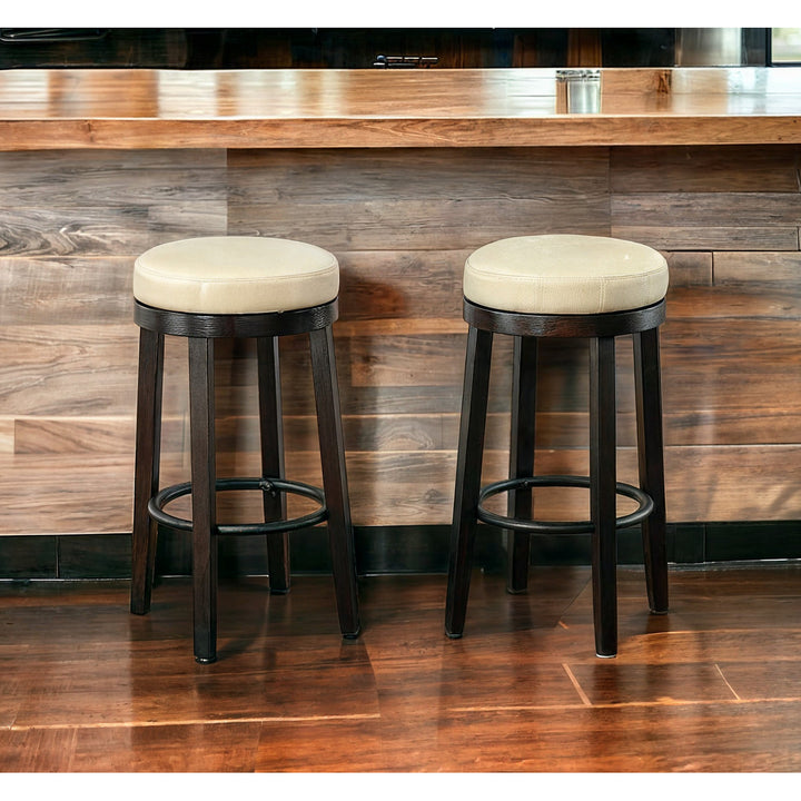 Set of Two 30" Cream And Espresso Faux Leather And Solid Wood Swivel Backless Bar Height Bar Chairs Image 7