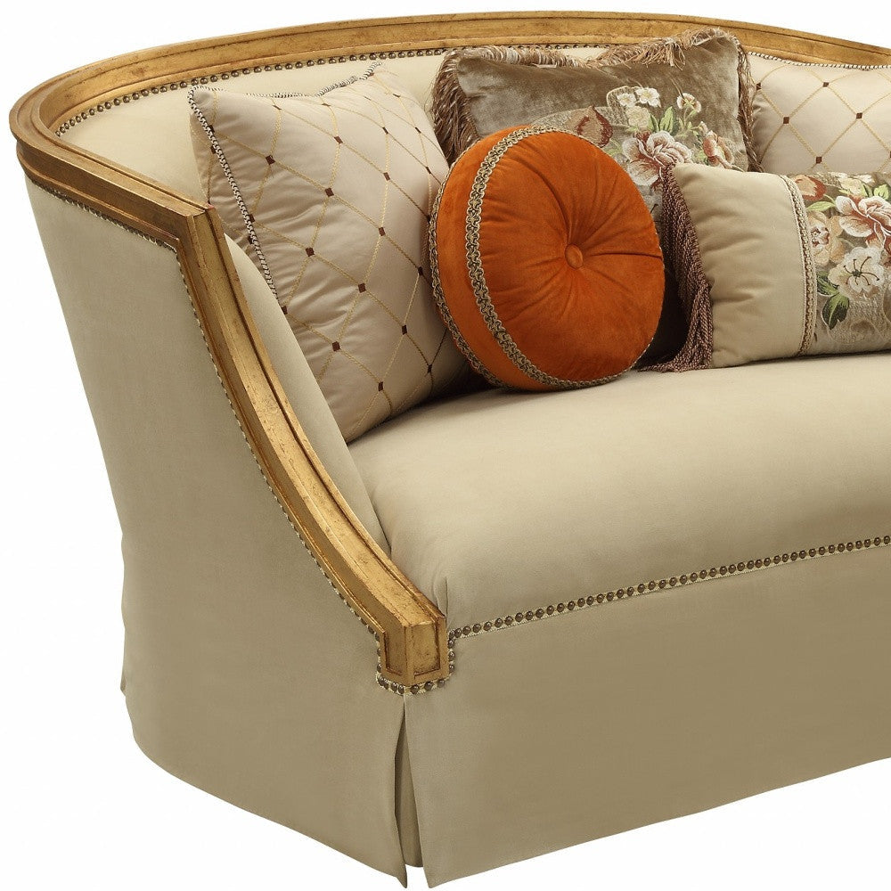 70" Tan And Gold Curved Loveseat and Toss Pillows Image 4