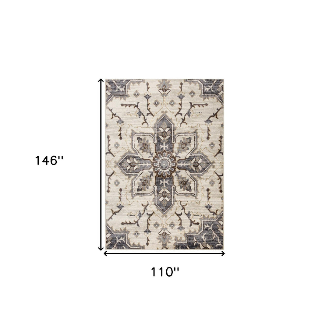 8 x 10 Blue and Ivory Medallion Power Loom Area Rug Image 1