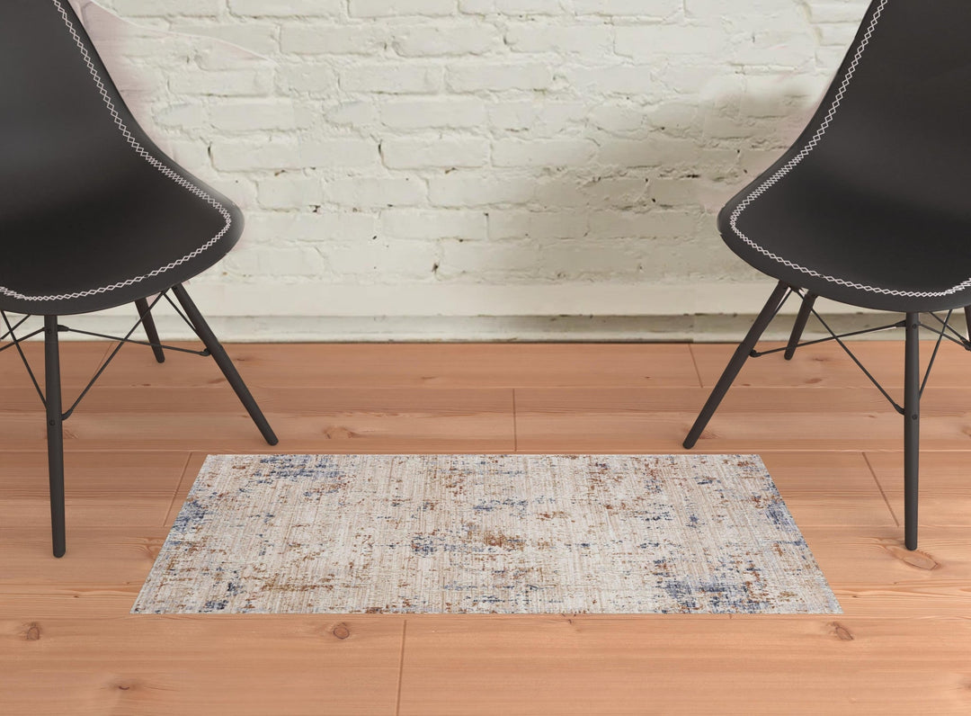 8 X 10 Ivory And Blue Abstract Area Rug Image 1