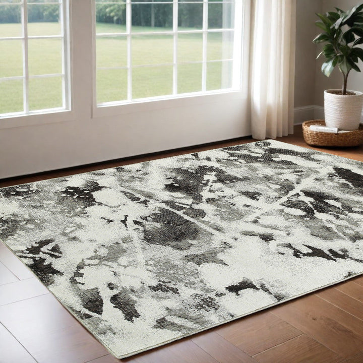 2 x 3 Gray and White Abstract Power Loom Area Rug Image 1