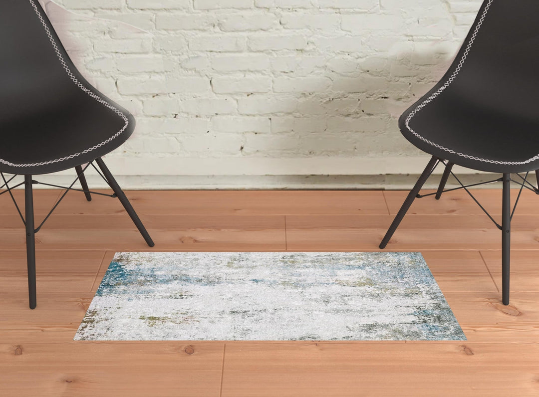 2 X 3 Ivory And Blue Abstract Printed Stain Resistant Non Skid Area Rug Image 2