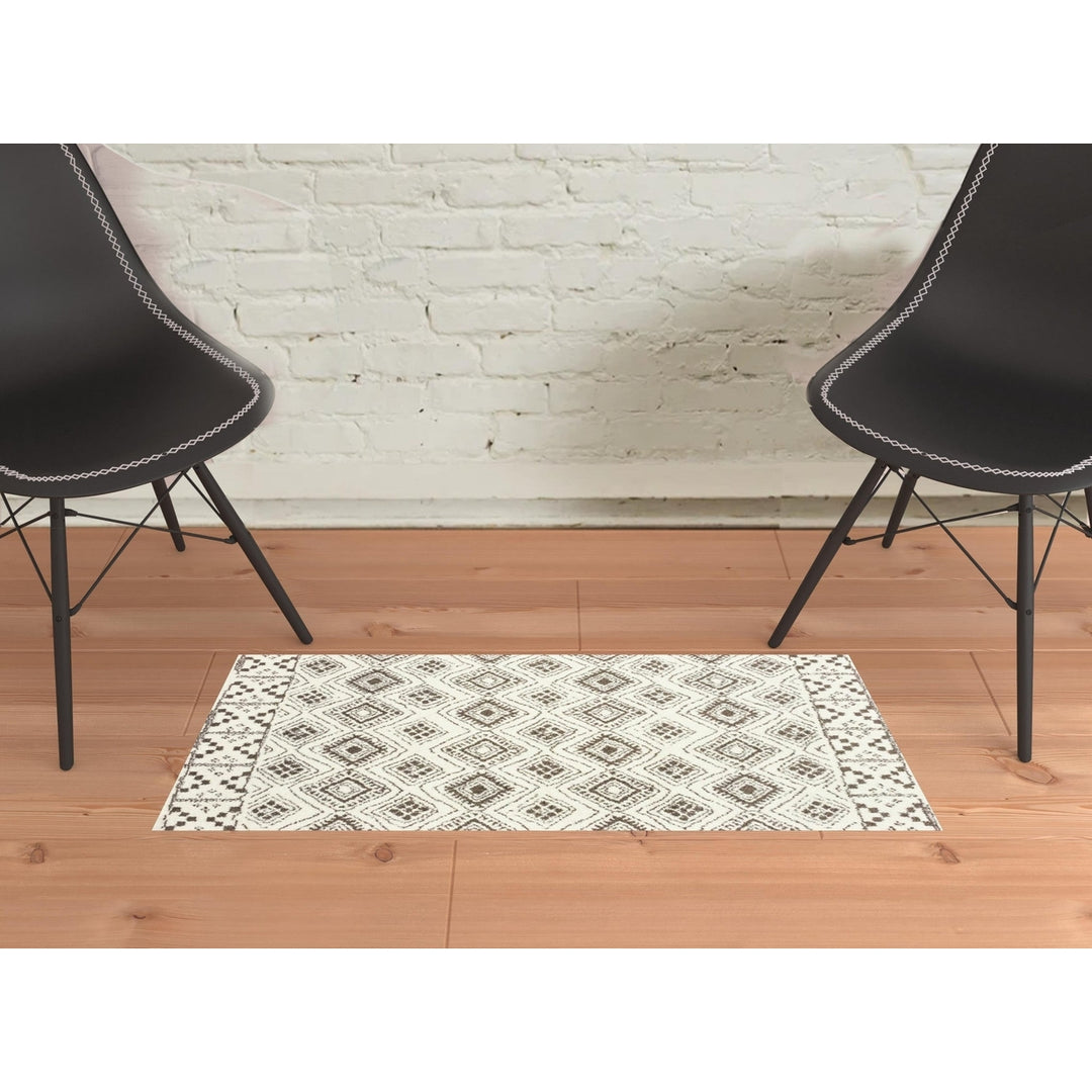 2 X 3 Ivory And Brown Geometric Shag Power Loom Stain Resistant Area Rug Image 2