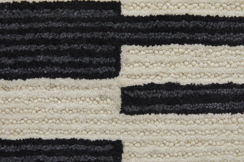 4 x 6 Ivory and Black Wool Abstract Hand Tufted Area Rug Image 1