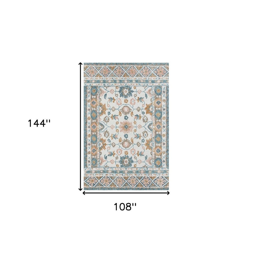 8 x 10 Blue and Ivory Wool Floral Hand Tufted Area Rug Image 1