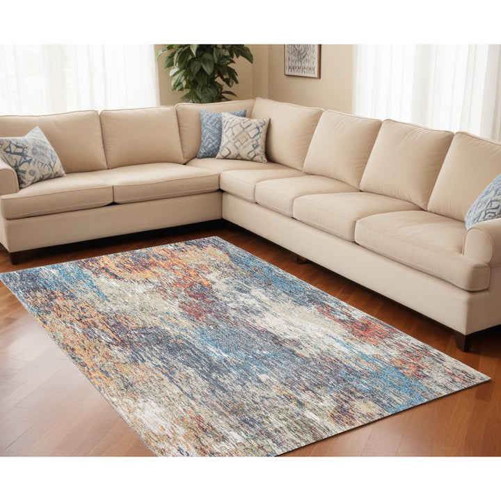 6 x 9 Blue and Beige Abstract Area Rug Image 1