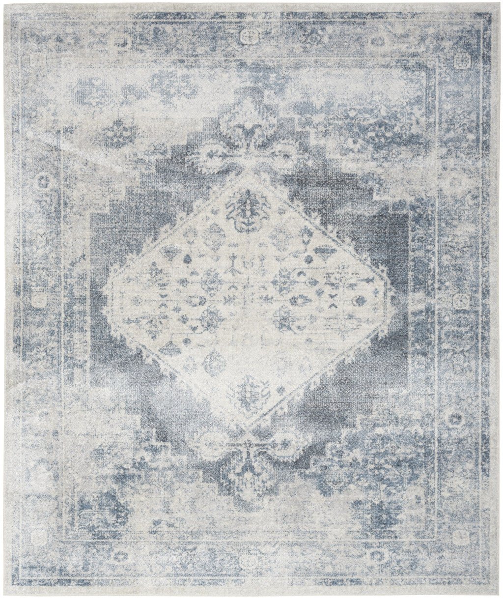 9 x 12 Blue and Ivory Oriental Power Loom Distressed Area Rug Image 1