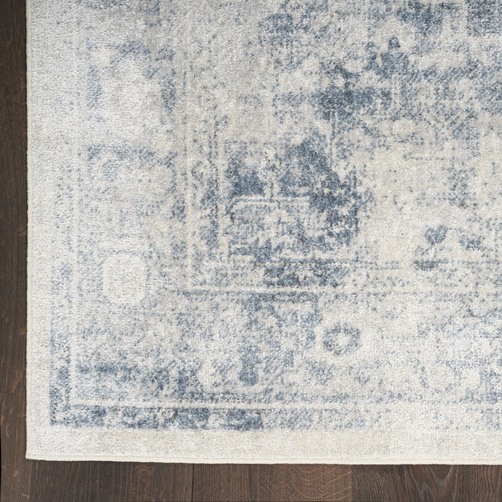 9 x 12 Blue and Ivory Oriental Power Loom Distressed Area Rug Image 3