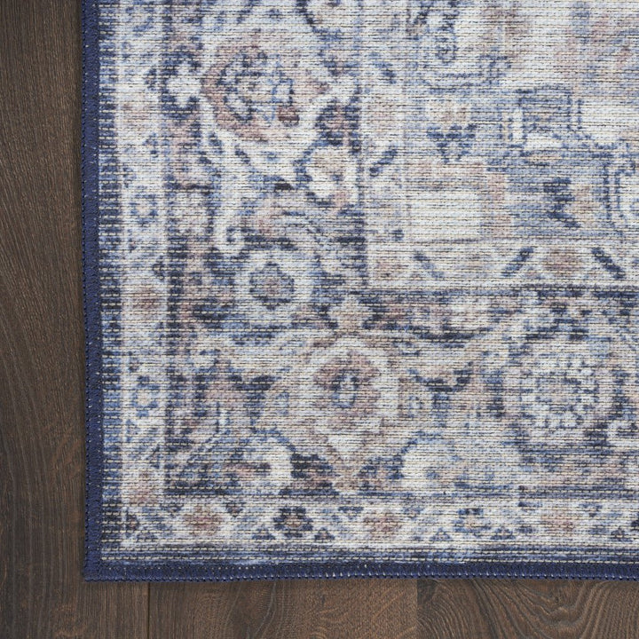 10 Blue and Ivory Floral Power Loom Distressed Washable Runner Rug Image 1