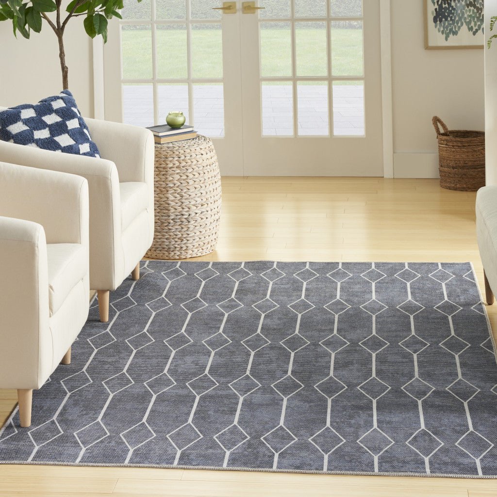 6 x 9 Blue and Ivory Geometric Power Loom Washable Area Rug Image 8