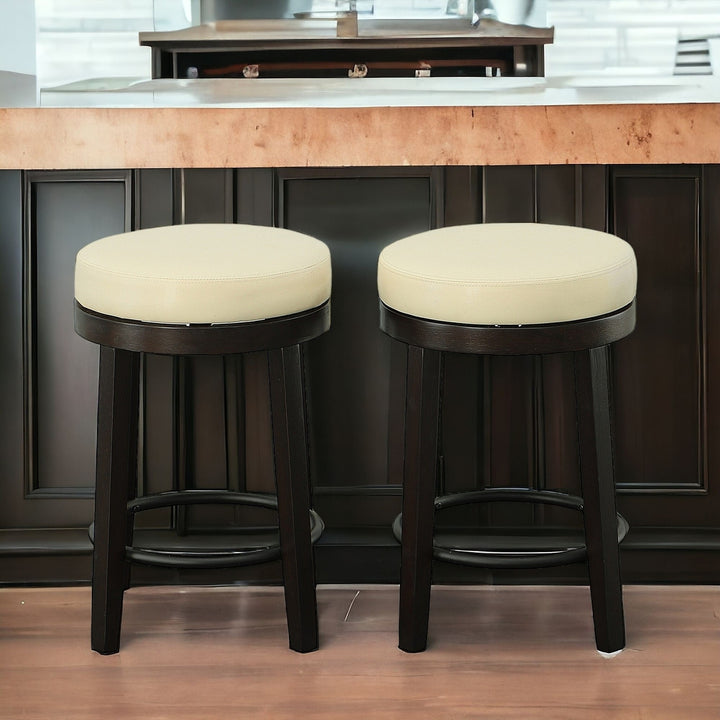 Set of Two 24" Cream And Espresso Faux Leather And Solid Wood Swivel Backless Counter Height Bar Chairs Image 7