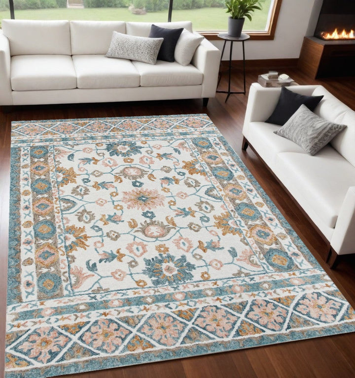 8 x 10 Blue and Ivory Wool Floral Hand Tufted Area Rug Image 1