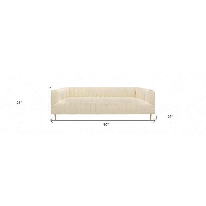 90" Ivory Velvet Sofa And Toss Pillows With Gold Legs Image 9