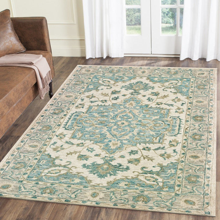 5 x 8 Turquoise and Cream Medallion Area Rug Image 1