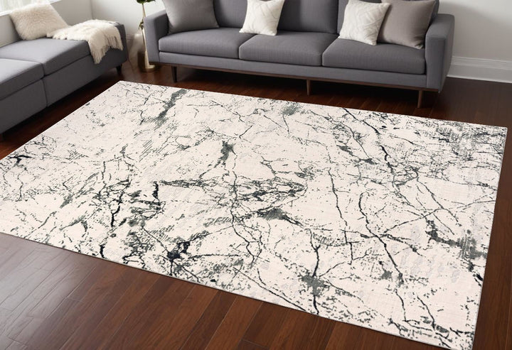 8 Ivory Abstract Area Rug Image 1