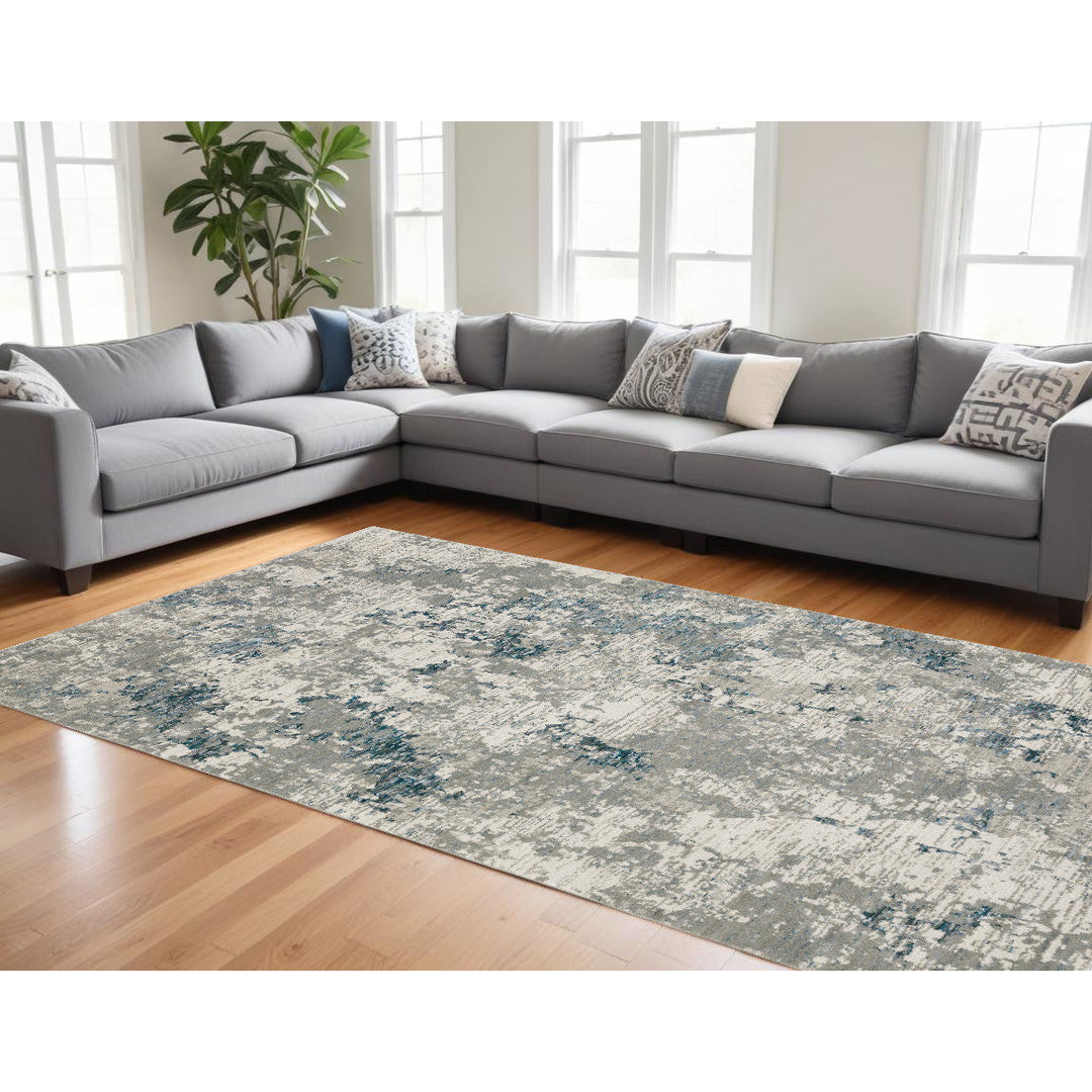 7 x 10 Blue and Beige Abstract Power Loom Area Rug Image 11