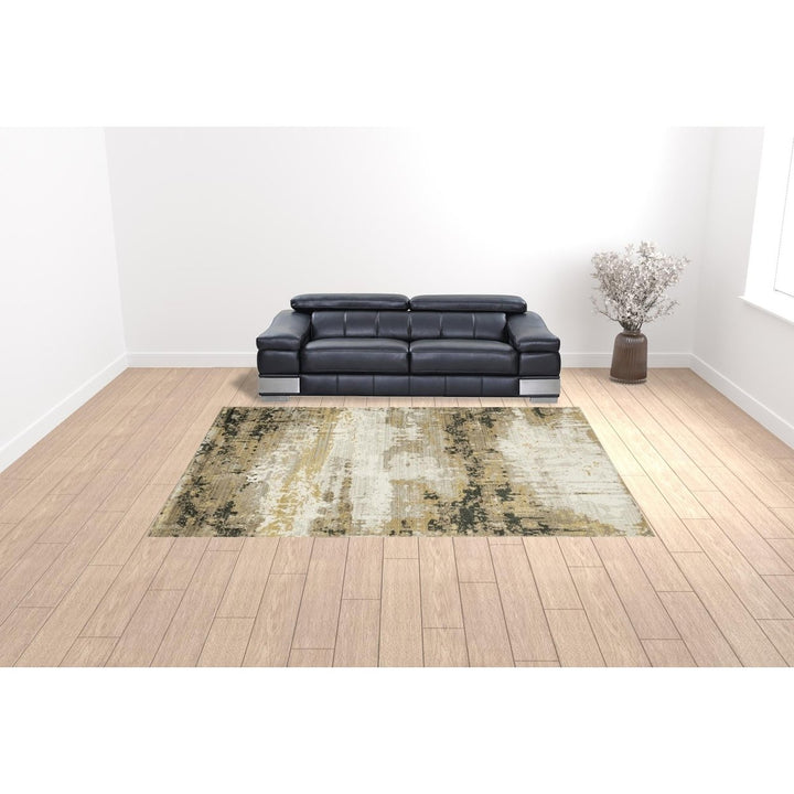 10 X 13 Grey Gold Black Charcoal And Beige Abstract Power Loom Stain Resistant Area Rug With Fringe Image 10