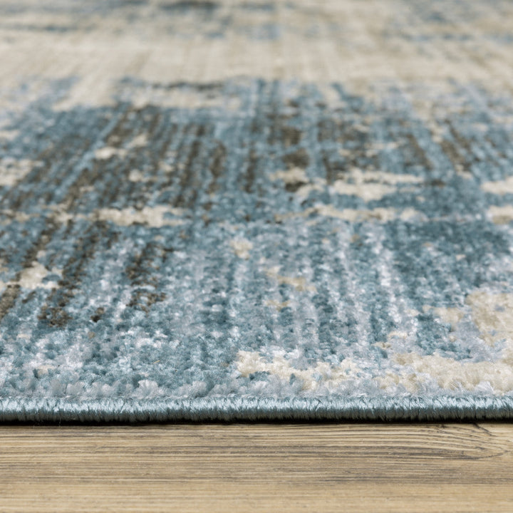 6 X 9 Blue Grey Ivory Light Blue And Dark Blue Abstract Power Loom Stain Resistant Area Rug With Fringe Image 5