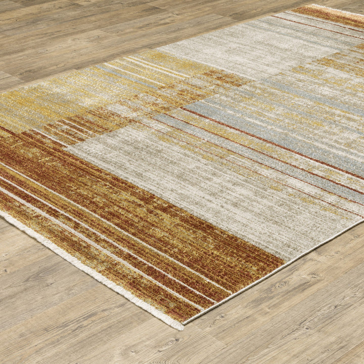 8 X 11 Rust Gold Blue Grey Ivory And Tan Geometric Power Loom Stain Resistant Area Rug With Fringe Image 3