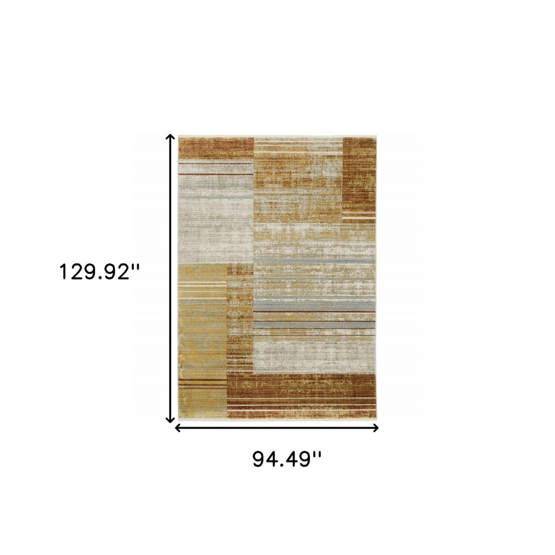 8 X 11 Rust Gold Blue Grey Ivory And Tan Geometric Power Loom Stain Resistant Area Rug With Fringe Image 10