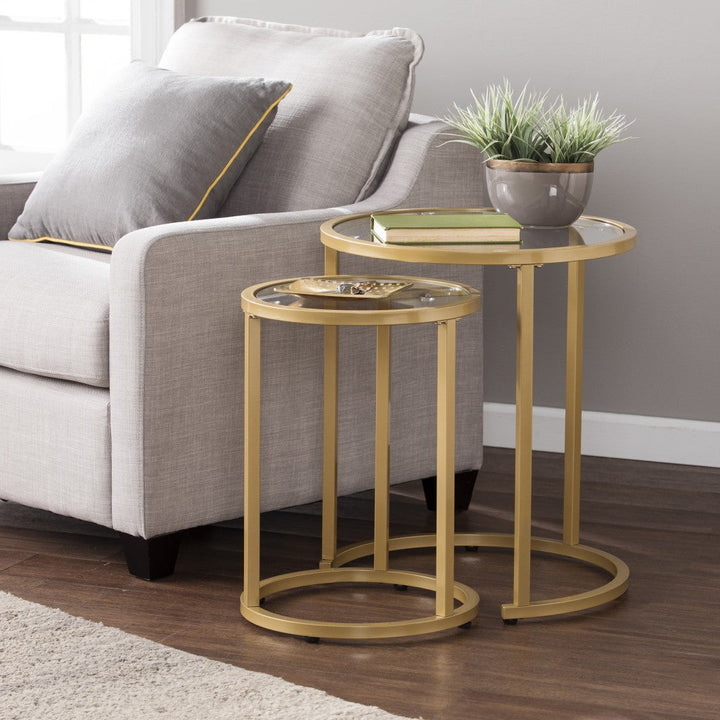 Set Of Two 23" Gold Glass And Steel Round Nested Tables Image 1