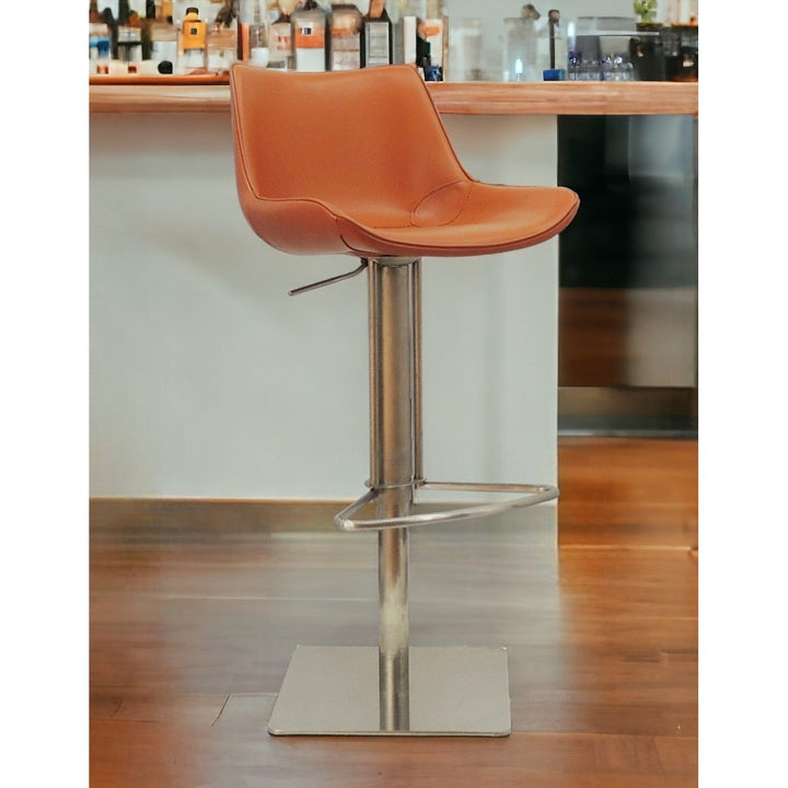 Adjustable Height Terra Cotta And Silver Faux Leather And Stainless Steel Swivel Bar Height Bar Chair Image 8