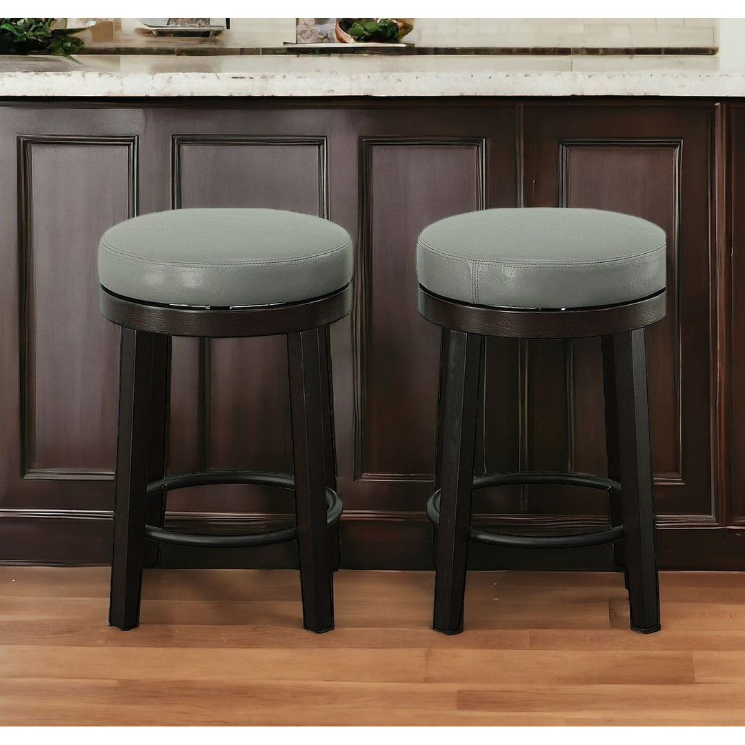 Set of Two 24" Gray And Espresso Faux Leather And Solid Wood Swivel Backless Counter Height Bar Chairs Image 6